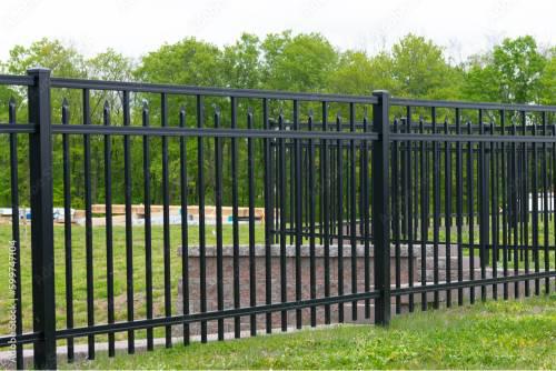 Smooth-top picket metal fence by Top Rail Fence
