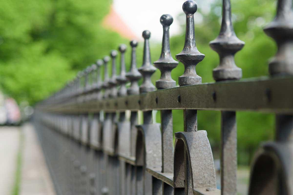 Spear-top picket metal fence by Top Rail Fence