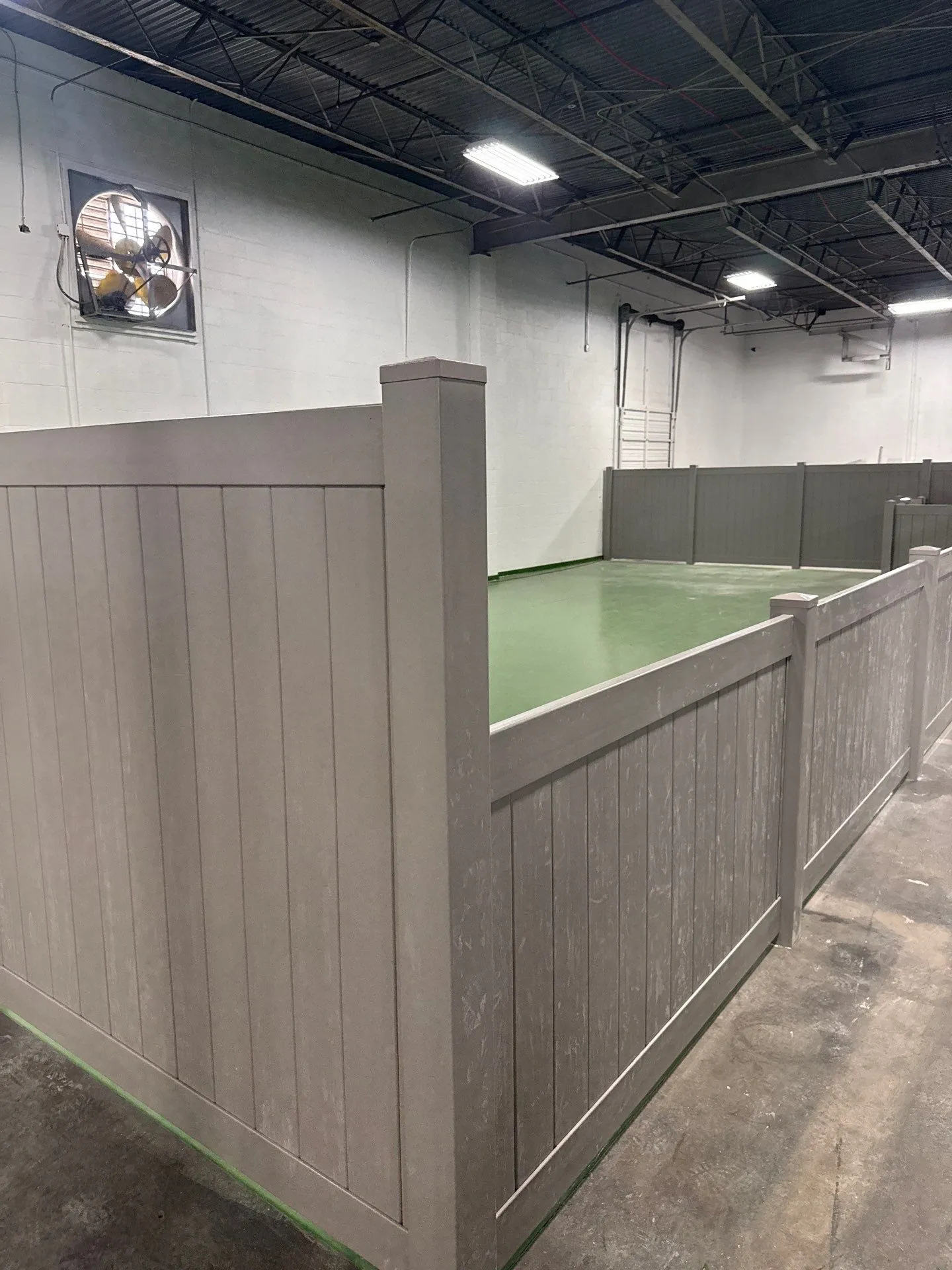 commercial fence installed by top rail fence