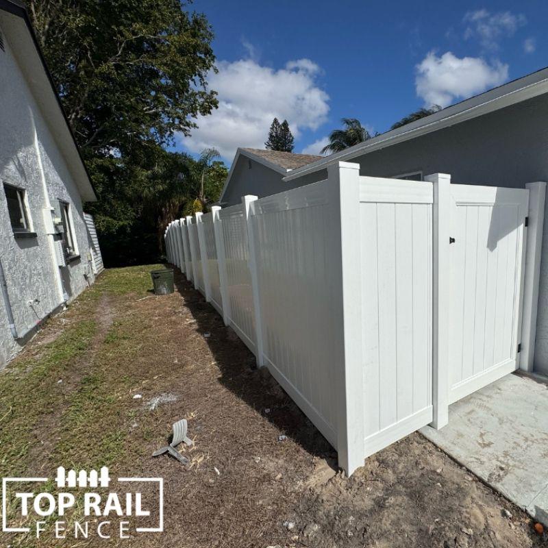 Vinyl fence install by Top Rail Fence