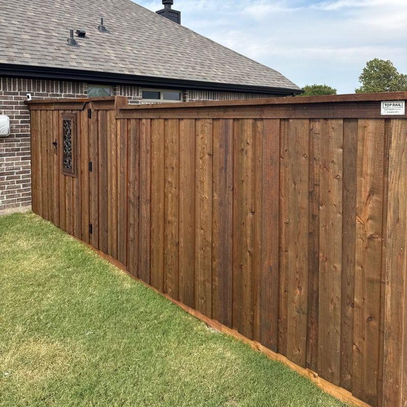 wood fence installed by Top Rail Fence