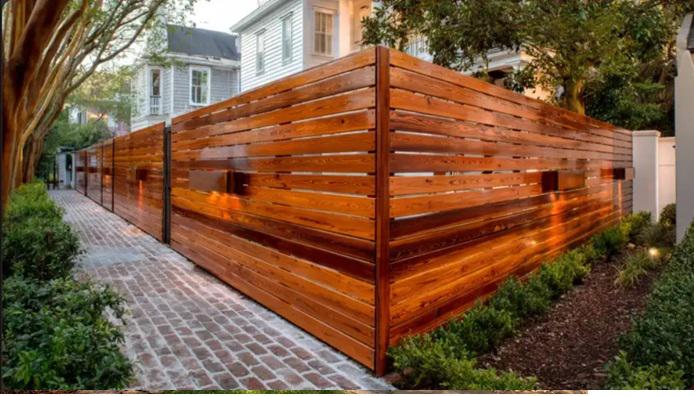 When wood fencing in Charleston starts acting like outdoor architecture instead of just a perimeter line
