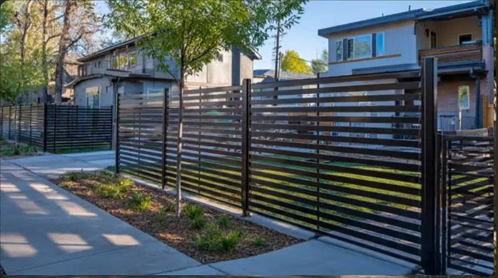 How Denver businesses and homes use metal fencing to create layers instead of single boundaries