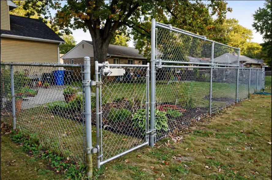 Omaha chain link projects can evolve after installation, as one Top Rail Fence approach shows with extensions and entry upgrades