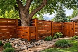 Keep Atlanta’s red clay from working against your wood fence by solving drainage before the posts go in