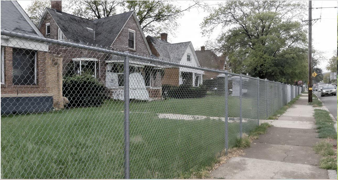 Chain link fencing in West St. Louis as a quiet divider that keeps sightlines fully intact