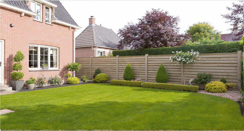 The transition from open yard to enclosed retreat through privacy fencing in Holland homes