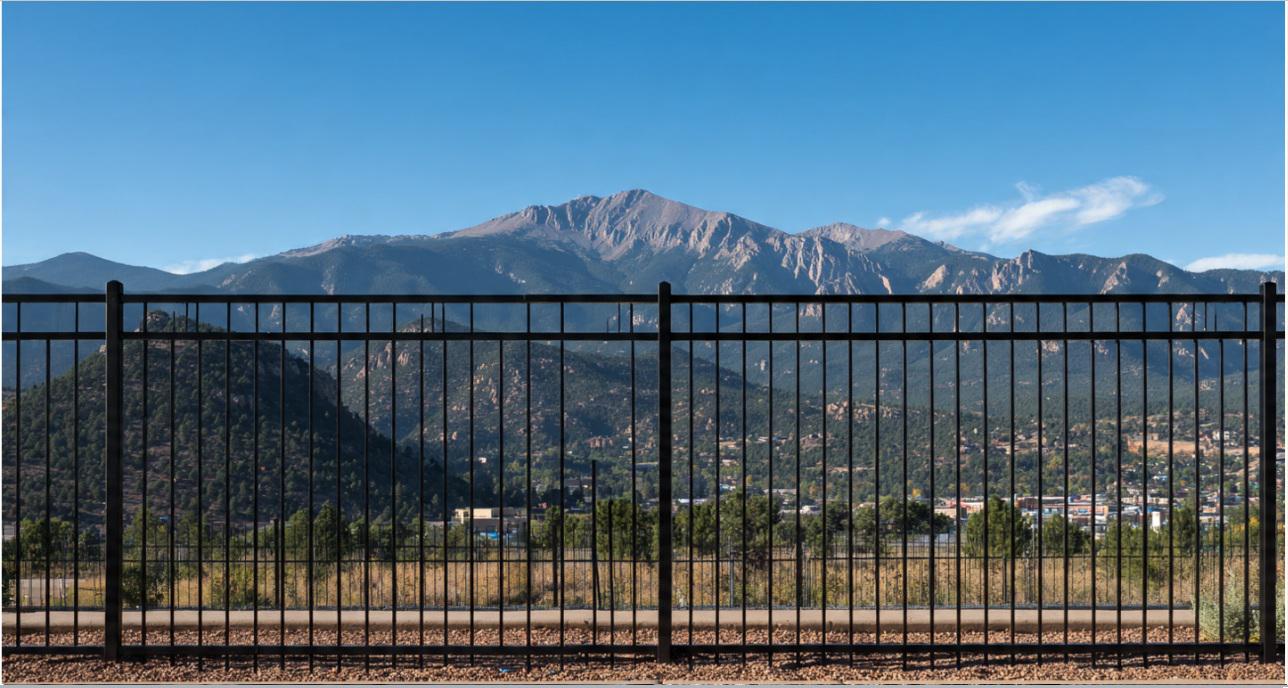 How metal fencing in Colorado Springs balances strength with uninterrupted mountain-facing views