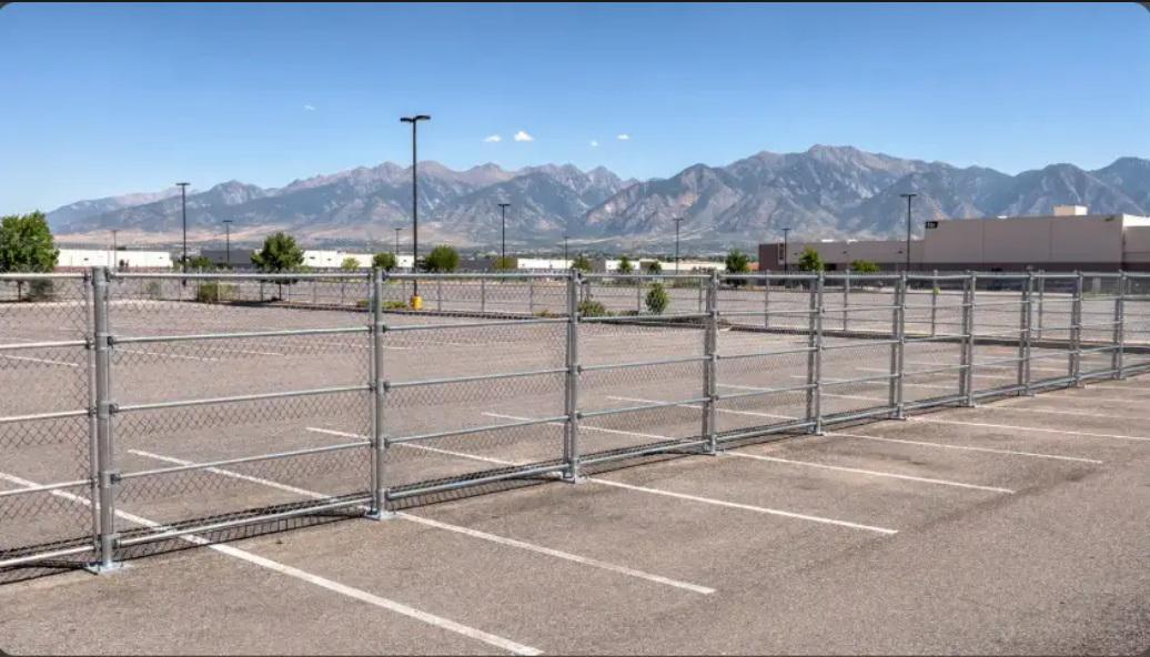 Commercial fencing layout strategies around high-wind corridors in Denver