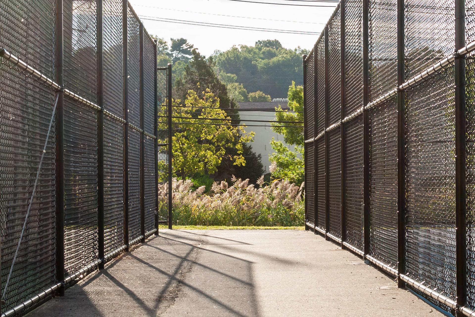 Permafused vinyl-coated chain link fence by Top Rail Fence
