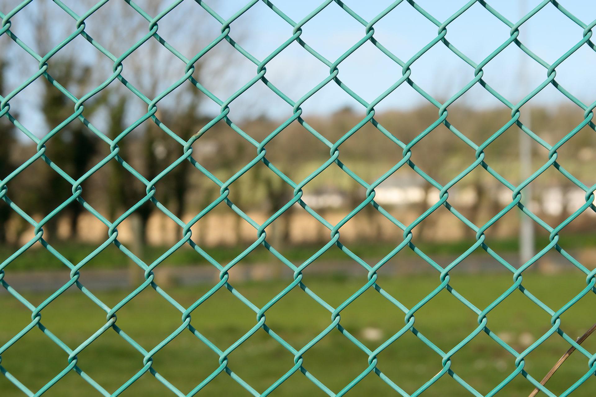 Spectra PVC-coated chain link fence by Top Rail Fence
