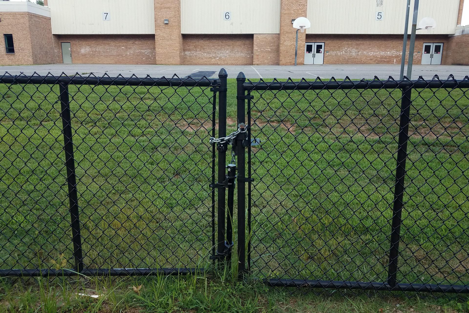 Chain link single swing gate by Top Rail Fence