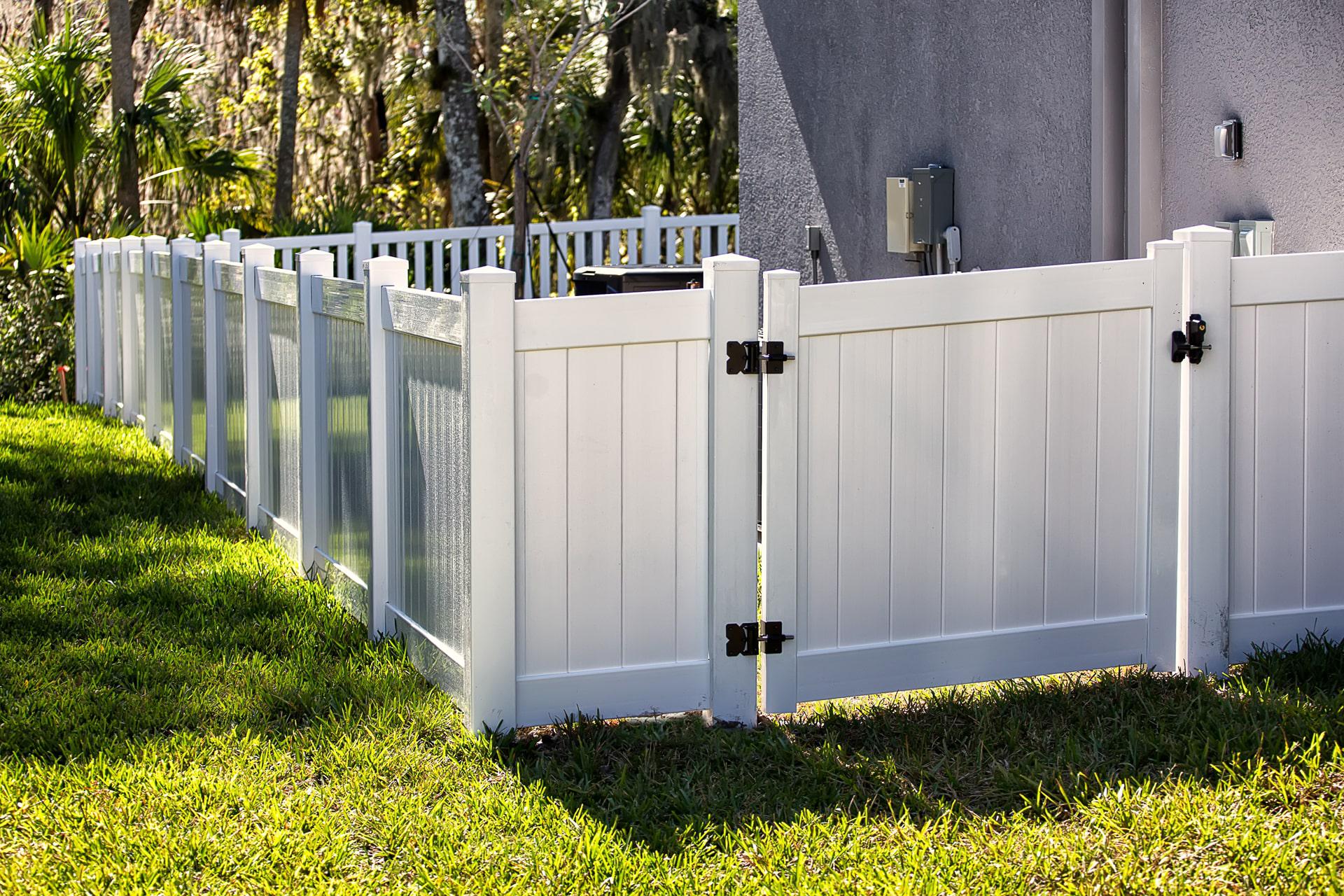 Vinyl single swing gate by Top Rail Fence