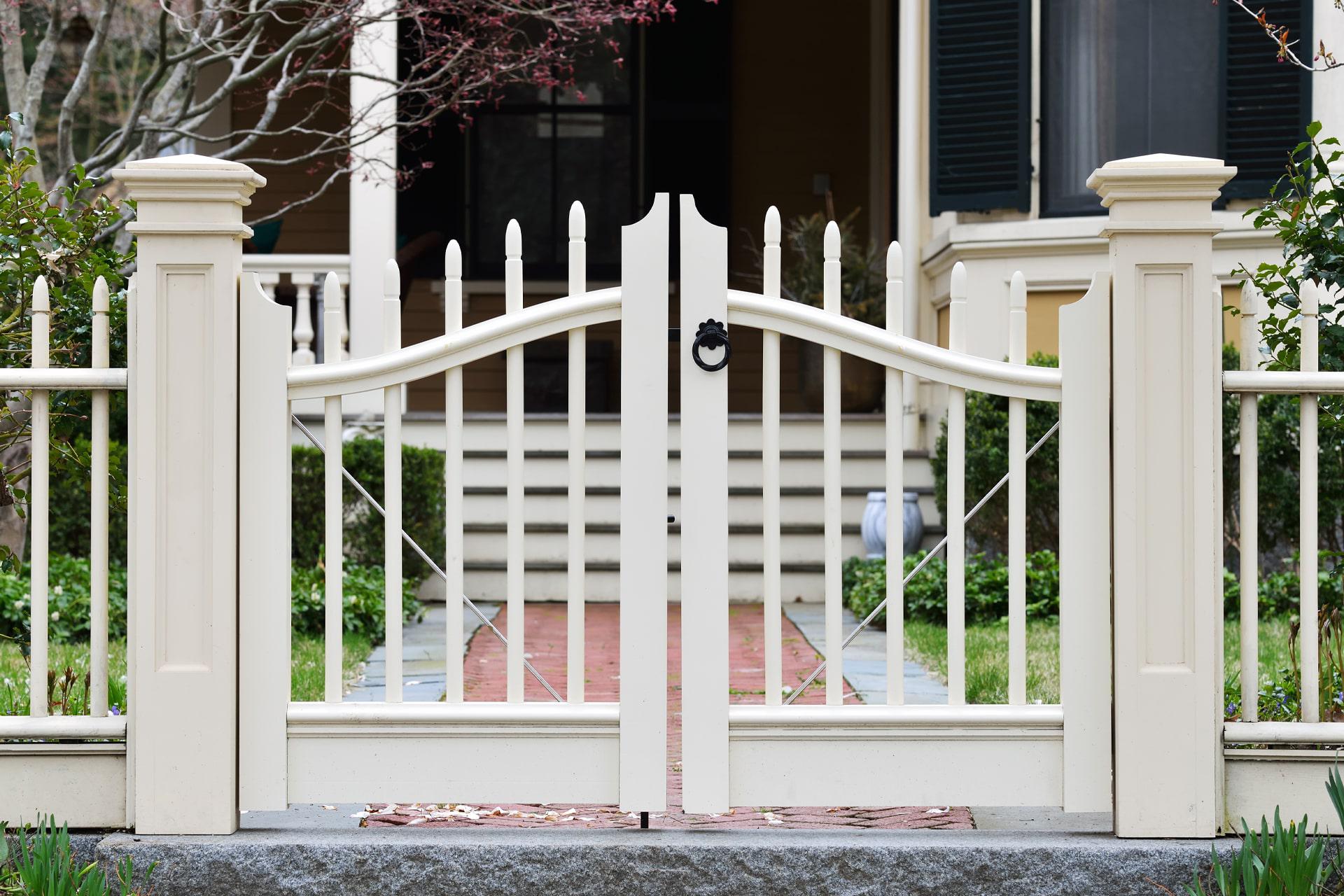 Wood double swing gate by Top Rail Fence