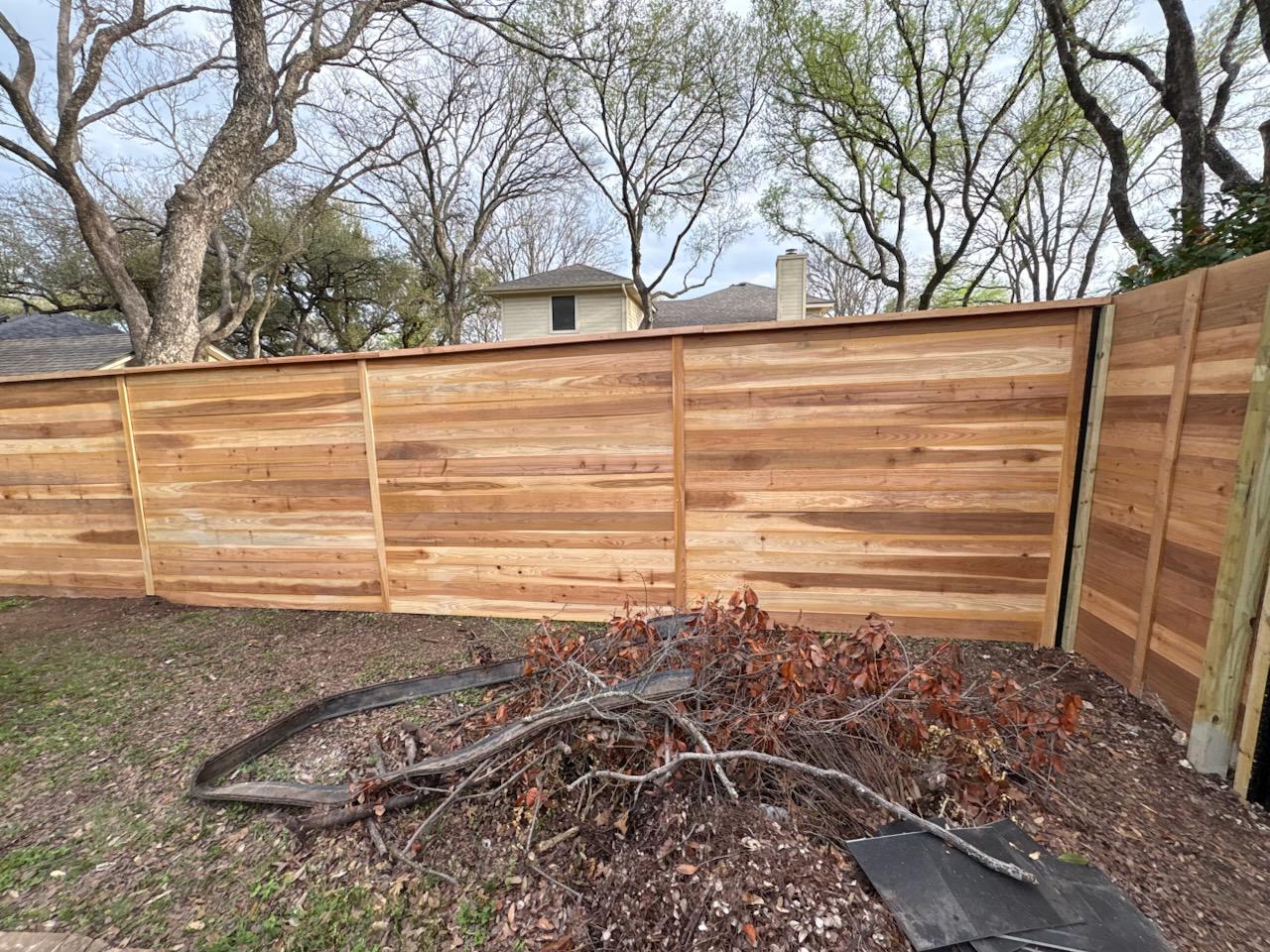 wood horizontal fence installed by top rail fence