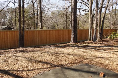 wood board on board fence installed by top rail fence