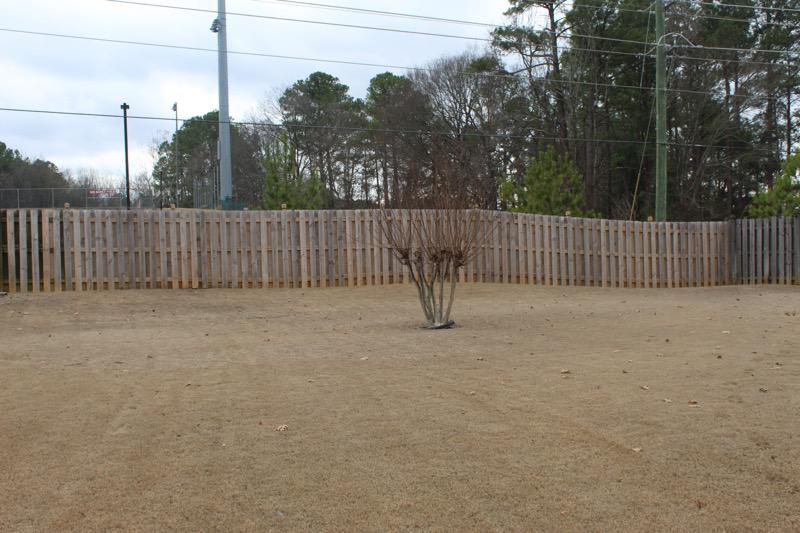 wood shadowbox fence installed by top rail fence