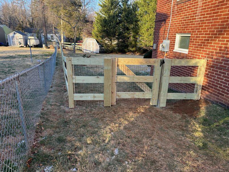 wood ranch rail fence installed by top rail fence