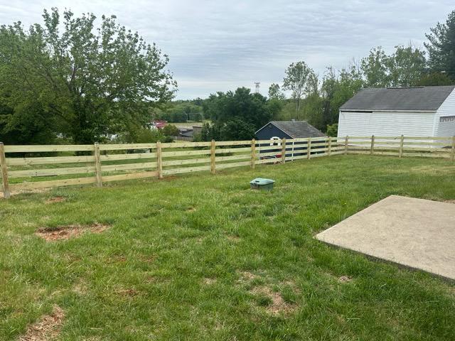 wood ranch rail fence installed by top rail fence