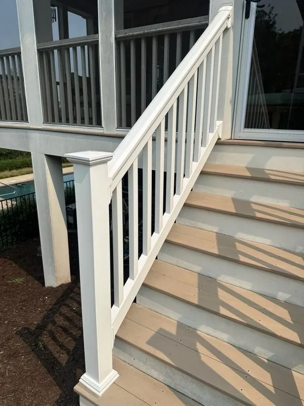 vinyl railing installed by top rail fence