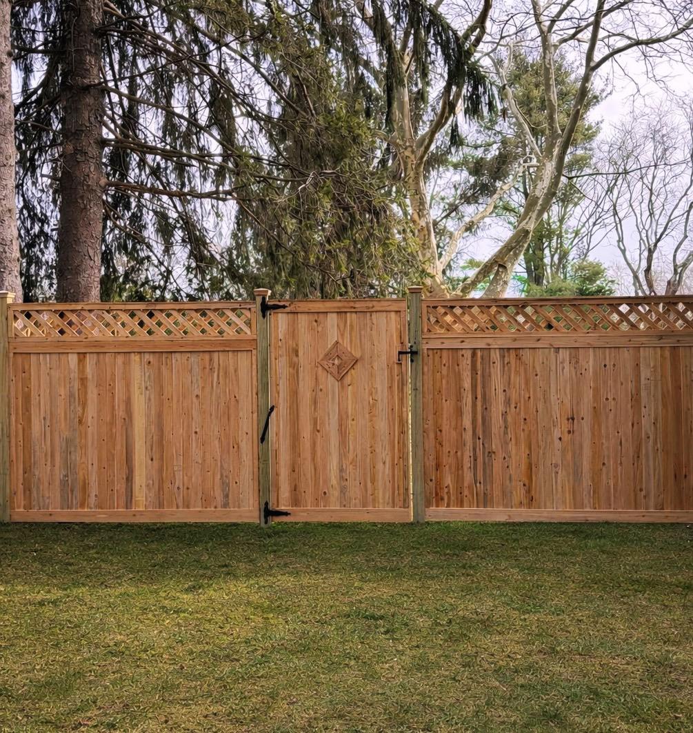 wood lattice top fence installed by top rail fence