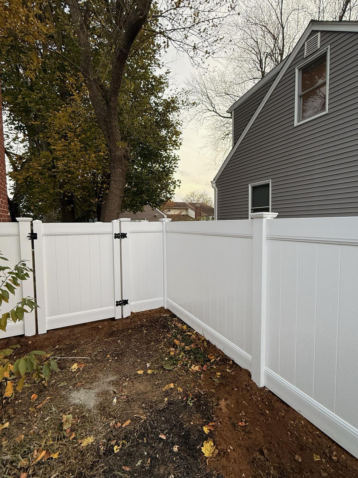 vinyl privacy fence installed by top rail fence