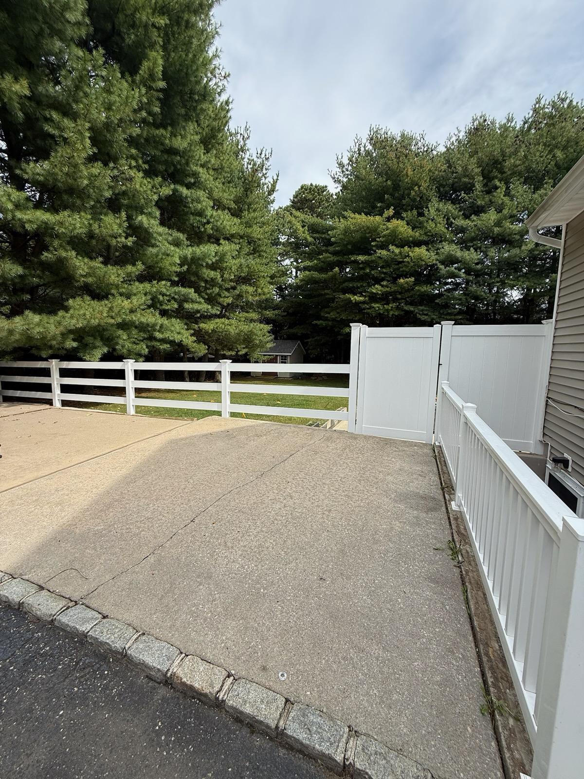vinyl ranch rail fence installed by top rail fence