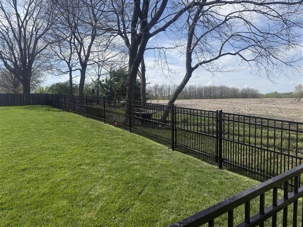 puppy picket ornamental fence installed by top rail fence