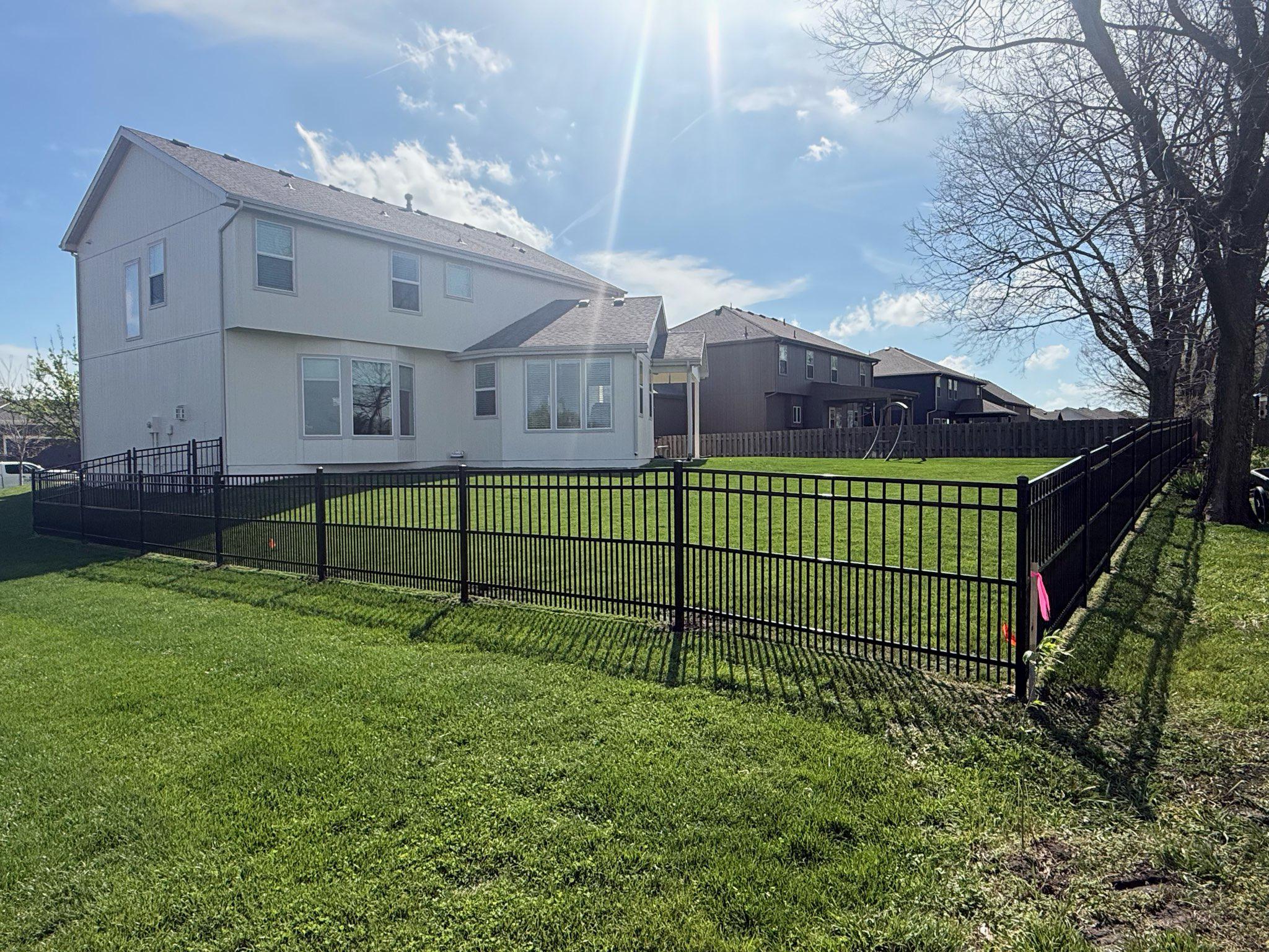 puppy picket ornamental fence installed by top rail fence