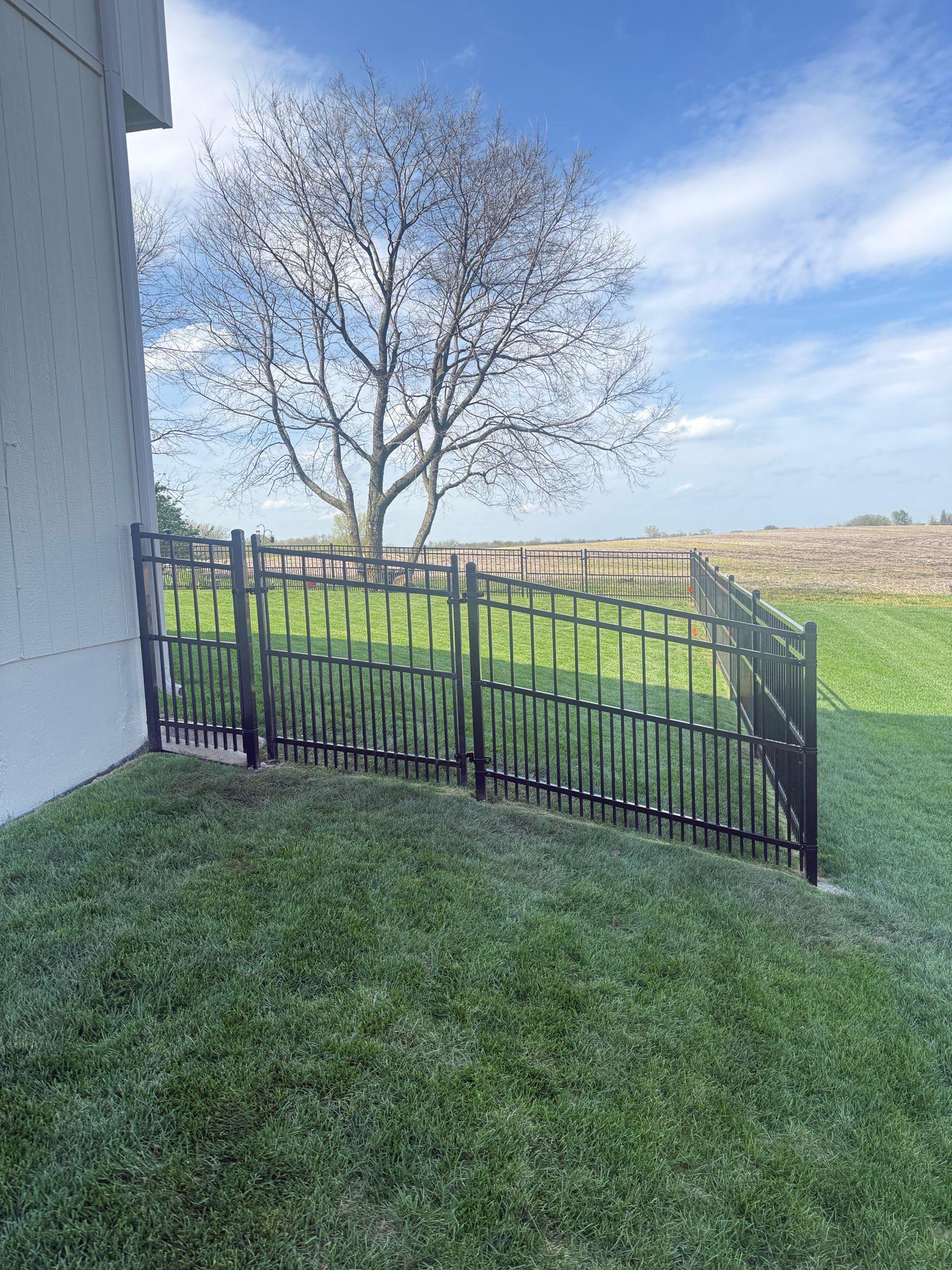 puppy picket ornamental fence installed by top rail fence