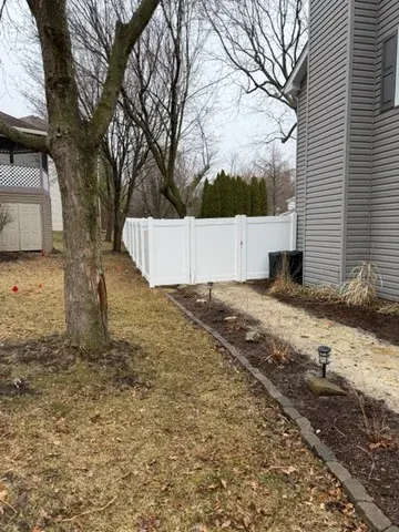 vinyl privacy gate installed by top rail fence 