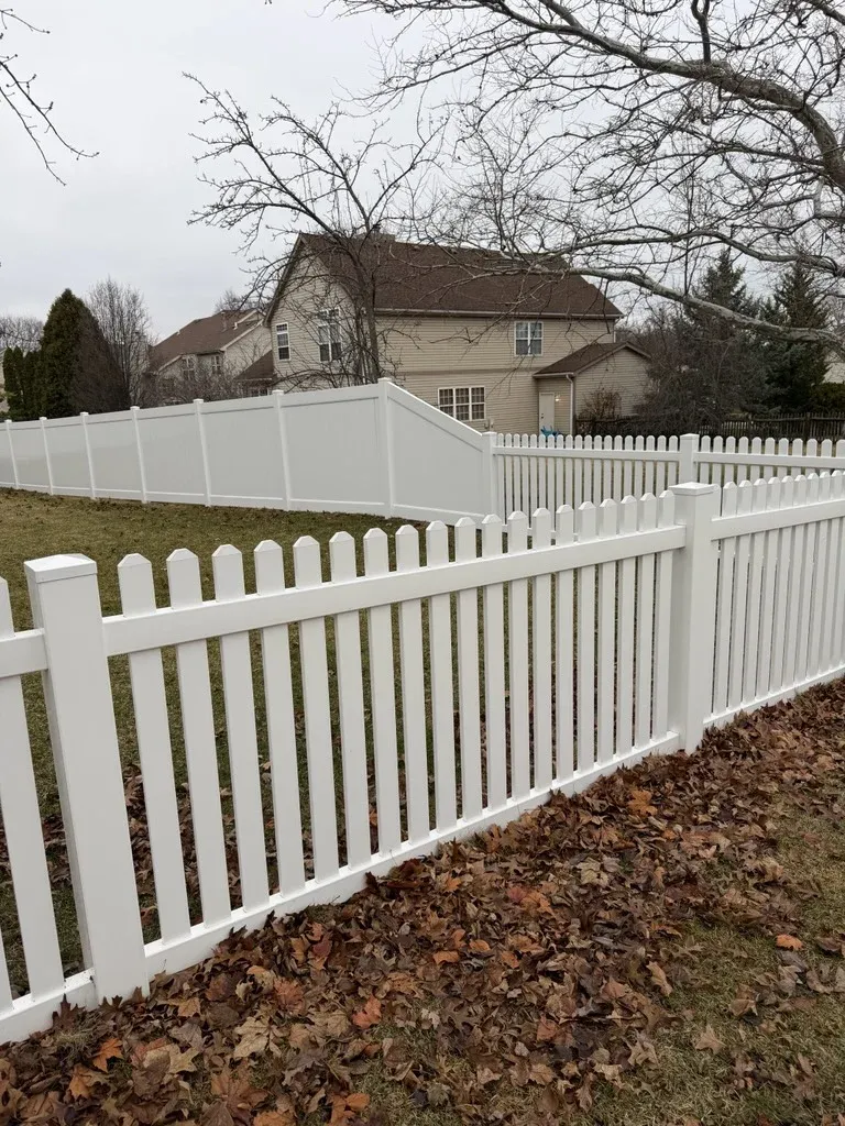 vinyl picket fence installed by top rail fence