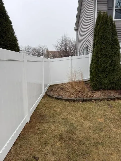 vinyl privacy fence installed by top rail fence