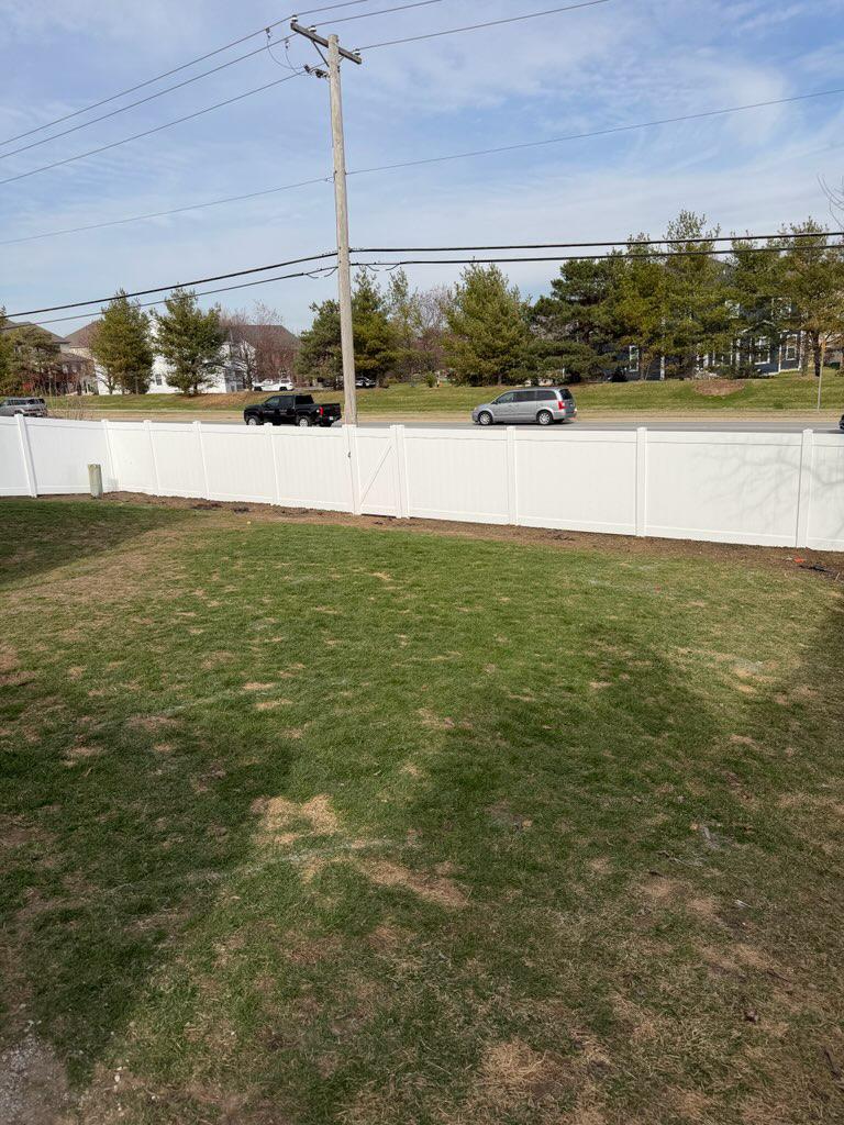 vinyl privacy fence installed by top rail fence