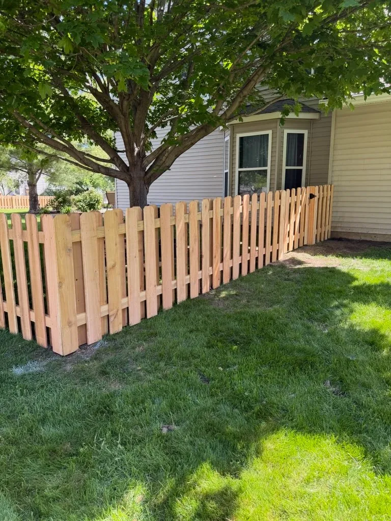 wood shadowbox fence installed by top rail fence