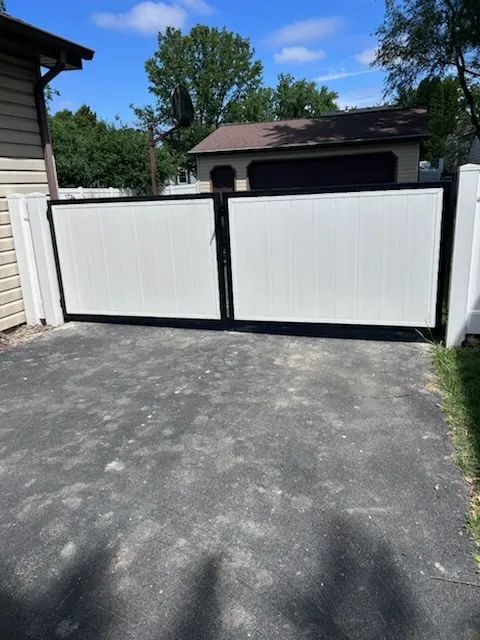 privacy gate installed by top rail fence