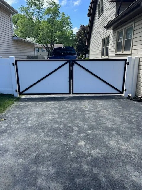 privacy gate installed by top rail fence