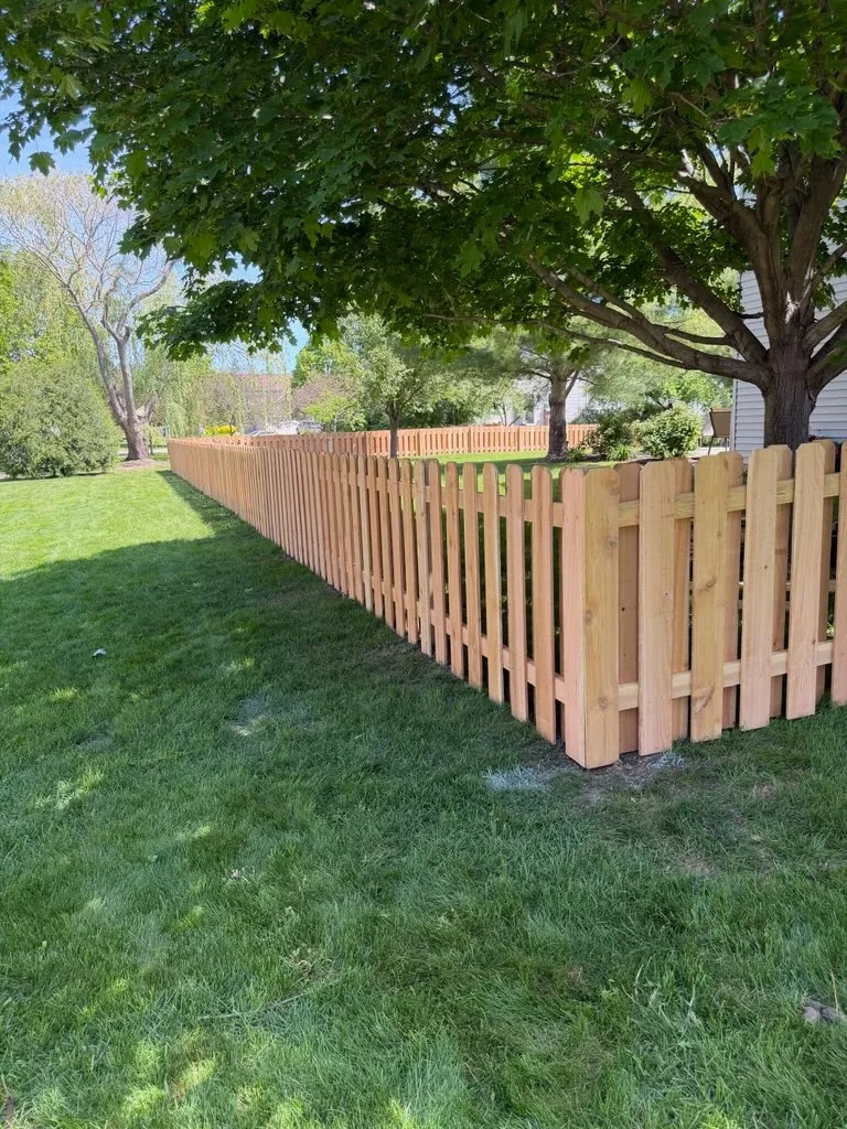 wood shadowbox fence installed by top rail fence