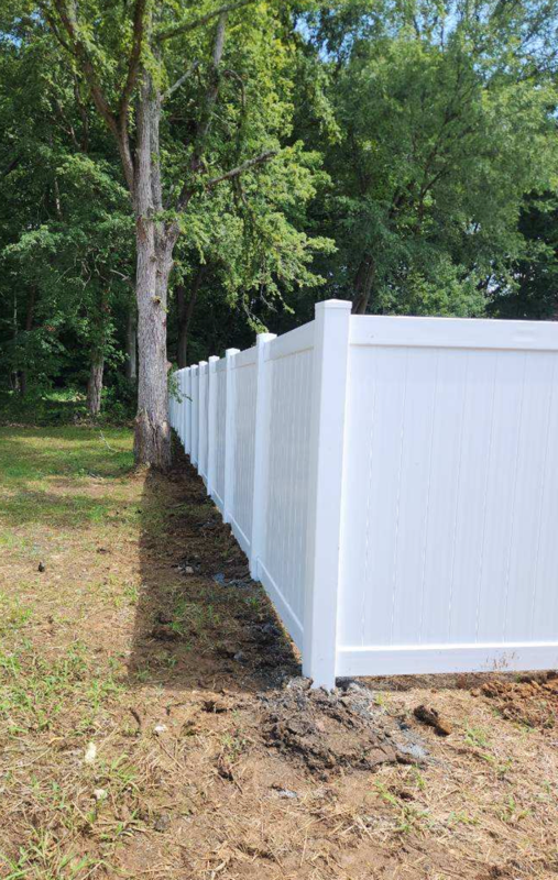 vinyl privacy fence installed by top rail fence