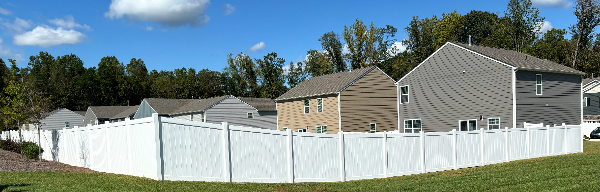 vinyl privacy fence installed by top rail fence