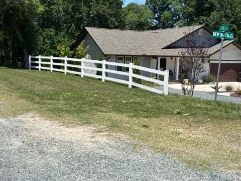 vinyl ranch rail fence installed by top rail fence