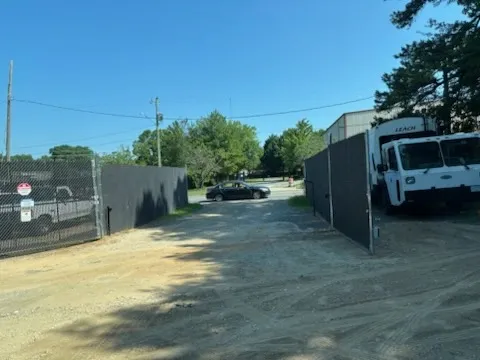 commercial chain link fence installed by top rail fence