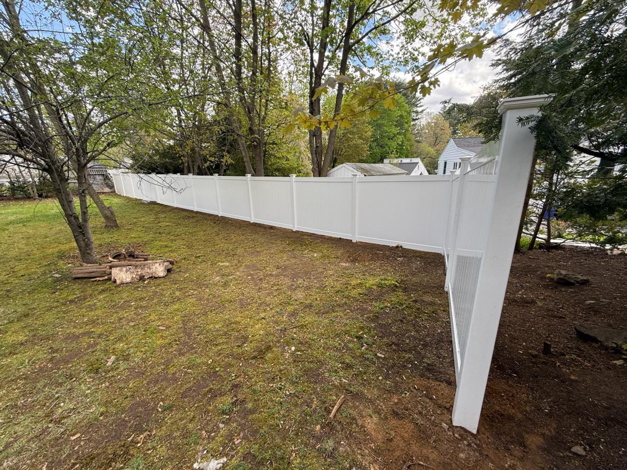 vinyl privacy fence installed by top rail fence