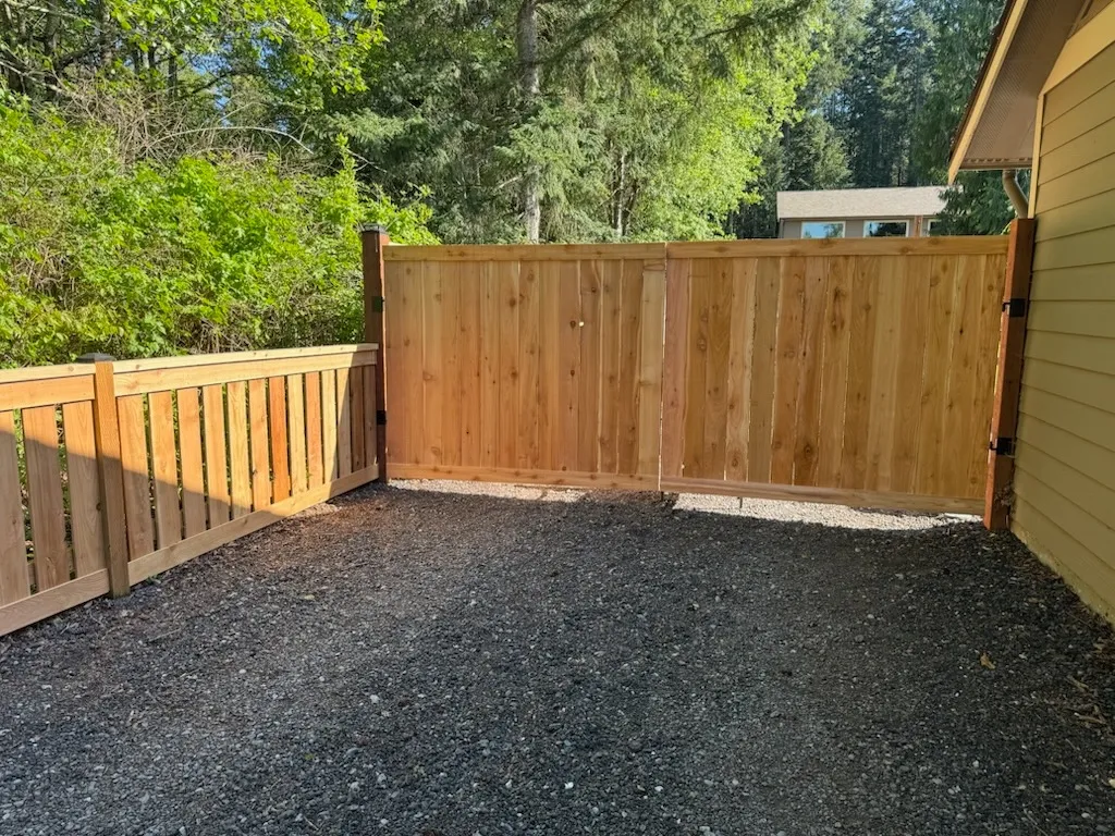 wood cap and trim fence installed by top rail fence