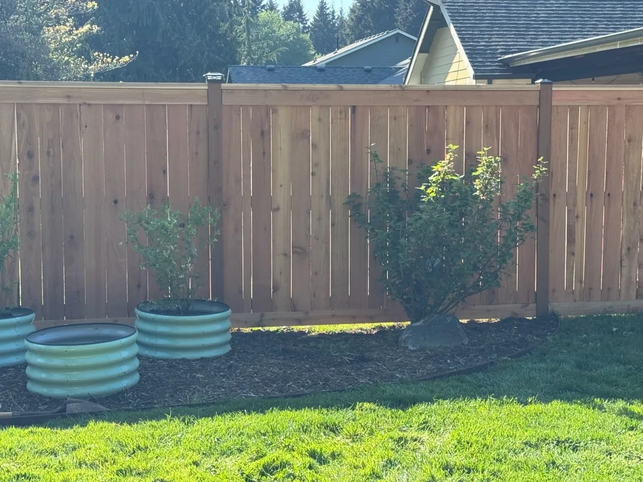 wood cap and trim fence installed by top rail fence
