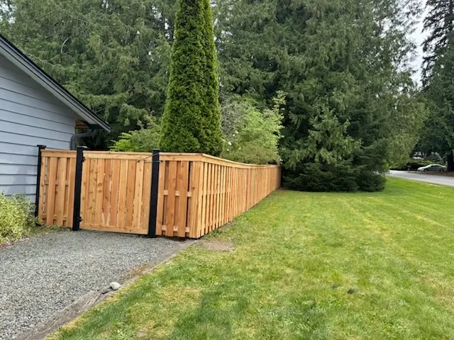 wood shadowbox fence installed by top rail fence