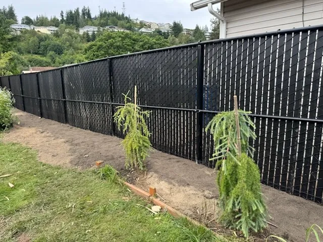 chain link fence installed by top rail fence