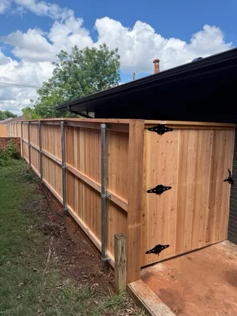 wood privacy fence installed by top rail fence