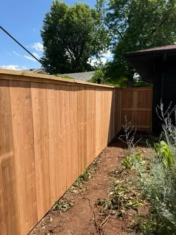 wood privacy fence installed by top rail fence