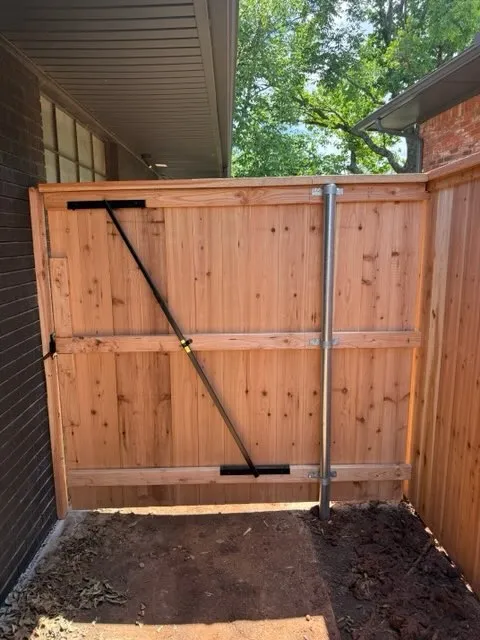 wood privacy fence installed by top rail fence
